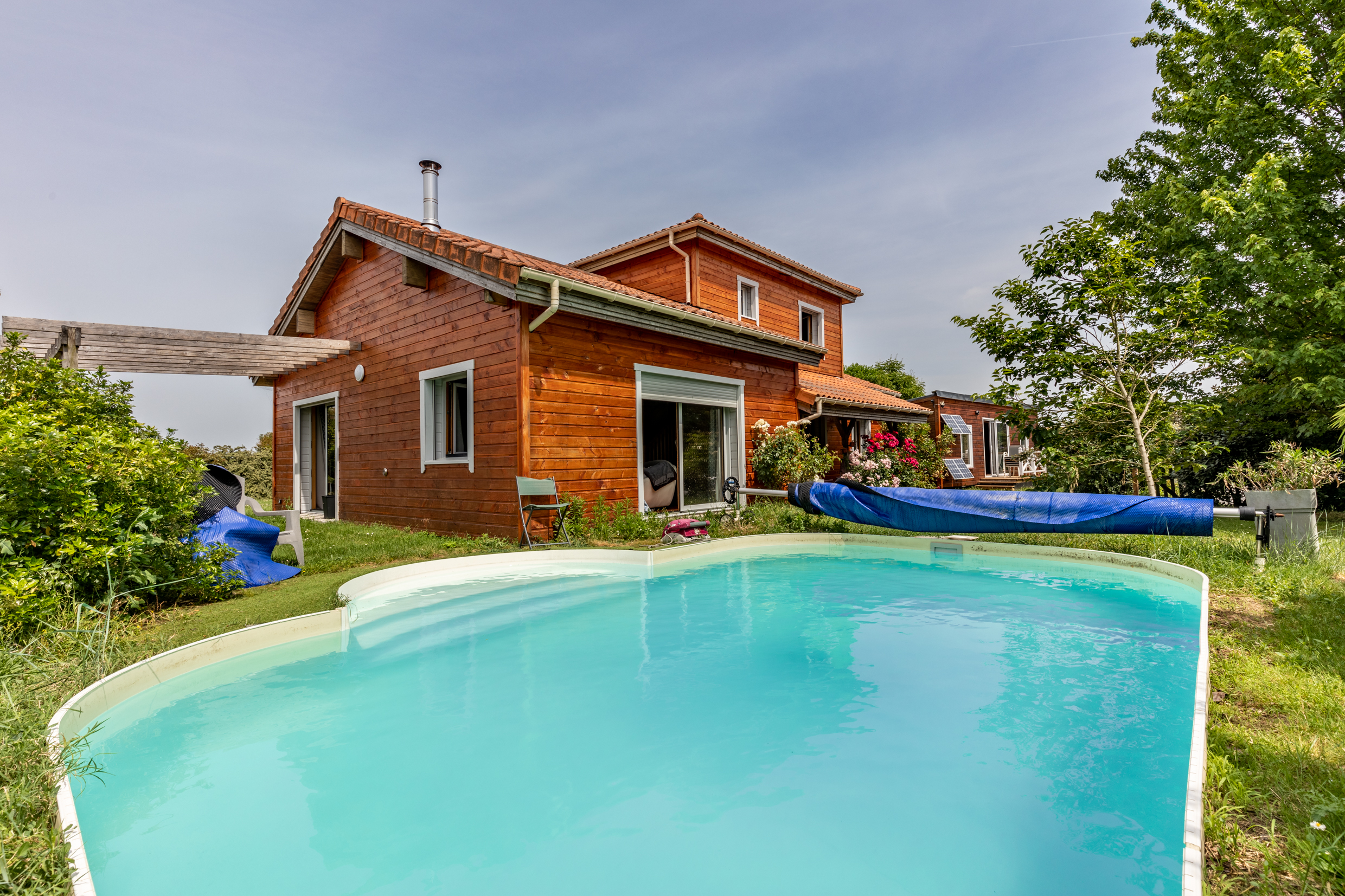 Maison bois avec piscine